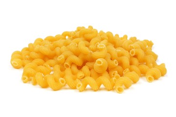 Pile of uncooked dry cavatappi pasta isolated on a white background