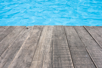 Swimming pool and wooden deck for backgrounds