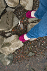 POV girlie feet at the edge of a stream