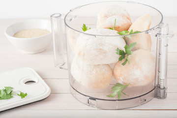 stale rolls with fresh parsley in food processor prepared to be