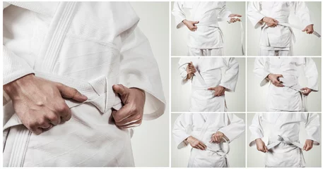 Photo sur Plexiglas Arts martiaux Karateka belt tying step by step pictures