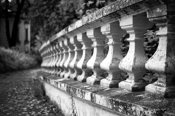 Fototapeta na wymiar Old stone balustrade in the park