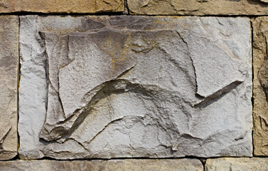 Texture of the gray stone wall
