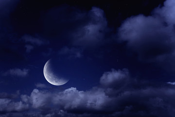 Naklejka na ściany i meble moon in a cloudy sky