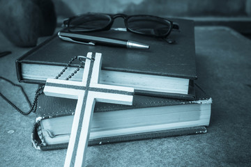Cross put the book
