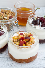 dessert with cream, peach and cherry  jam, top view
