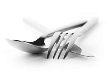 Fork, spoon and knife on white - obrazy, fototapety, plakaty