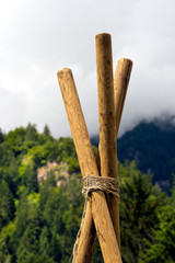 Scout Construction with Poles and Ropes. Detail of a Scout construction with three wooden poles and ropes