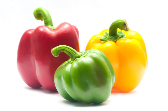 fresh yellow, red and green bell peppers
