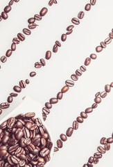 Coffee beans pattern with a coffee cup on top