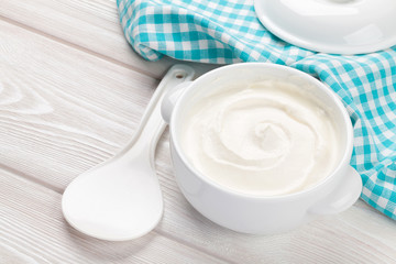 Fototapeta na wymiar Sour cream in a bowl