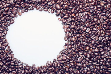 Coffee beans texture with a white circle for text