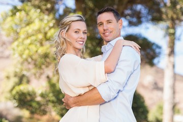 Fototapeta premium Portrait of smiling couple embracing