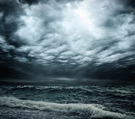 Acrylic prints Water Stormy sky over an ocean