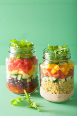 vegan quinoa vegetable salad in mason jars