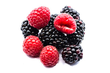 Close up blackberry and raspberry isolated on white background