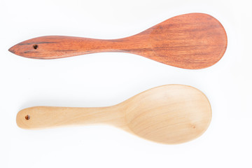 wooden spoons on white background