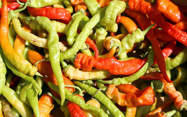 green and red spicy chilis background