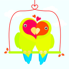 Lovely and cute parrots lovebirds sitting on the swing. Valentines day.