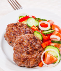 beef burger with vegetables salad