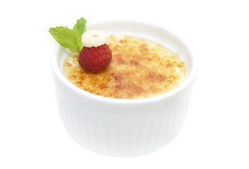 portion of the cream brulee on a white background