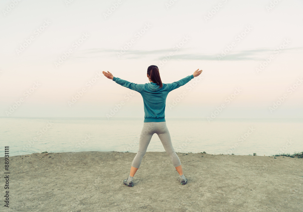 Poster Girl workout on coast in the morning