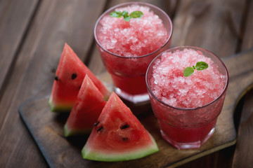 Close-up of watermelon granita and fresh watermelon slices