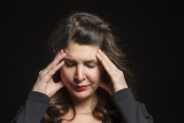 Studio portrait of a stressed Caucasian female