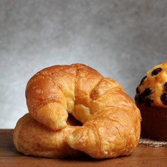 croissant bakery on teakwood table