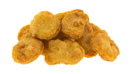 Small mound of chicken nuggets on a white background