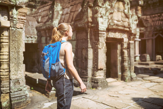 Female tourist and the Preah Khan temple in Angkor, Cambodia