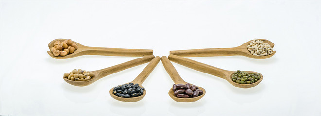 Collection of cereals, beans and grains on white background