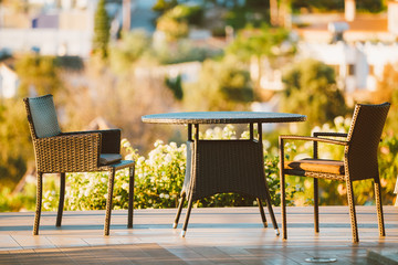 Home Exterior With Table And Chairs In Wooden Terrace