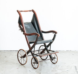 Fototapeta na wymiar classical old vintage style stroller in vintage room