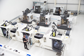 High Angle View Of Engineering Workshop With CNC Machines
