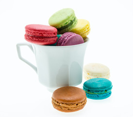 Colorful macarons on white background. Macaron is sweet meringue