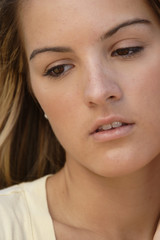 Fototapeta premium Close-up of a young woman in thought.