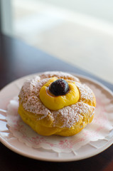 cream puff with black cherry