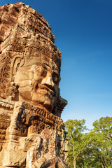 Enigmatic smiling giant stone face of Bayon temple, Cambodia
