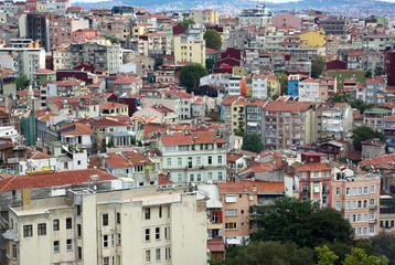 Fototapeta na wymiar Types of Istanbul aerial view. Houses and public buildings densely cover an area of Istanbul. This is due to the fact that the buildings in Istanbul, built very close to each other. 