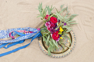 Beautiful wedding bouquet in the desert sand 