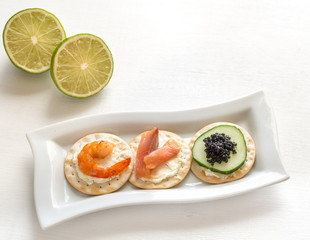 Canape with seafood on the plate