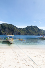 Fototapeta na wymiar Typical philippine boats at beach