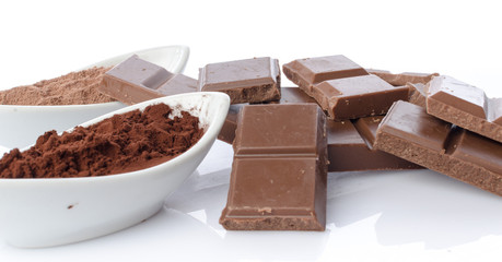 Chocolate squares and cocoa powder