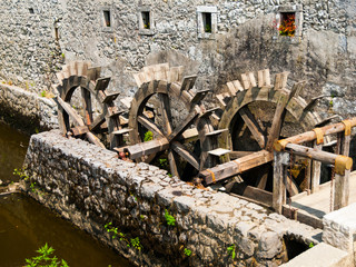 Three wheeled wooden mill © pyty