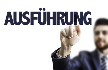 Business man pointing the text: Execution (in German)