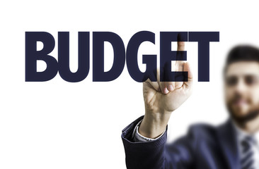 Business man pointing the text: Budget