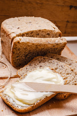 Still life fresh bread with butter and honey