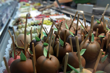 Chocolate-dipped apples on the market of Oktoberfest in Munich, Germany