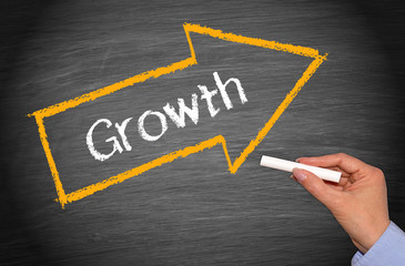 Growth chalkboard with arrow
